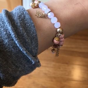 Pink and gold tassel bracelet